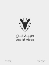 The Dabiat Alban mark, a gazelle head with the Arabic and English name, on a pale grey card